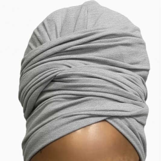 Gray headscarf wrapped around a person's head on a white background